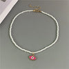 Evil Eye Charm Necklace with Colorful Beads in a Choker Style - Image 7