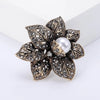 Rhinestone Flower Brooch Pin with Pearl and Leaf Designs - Image 5