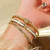 Open Stainless Steel Bangle with Decorative Stone Details in Multiple Styles - Image 2