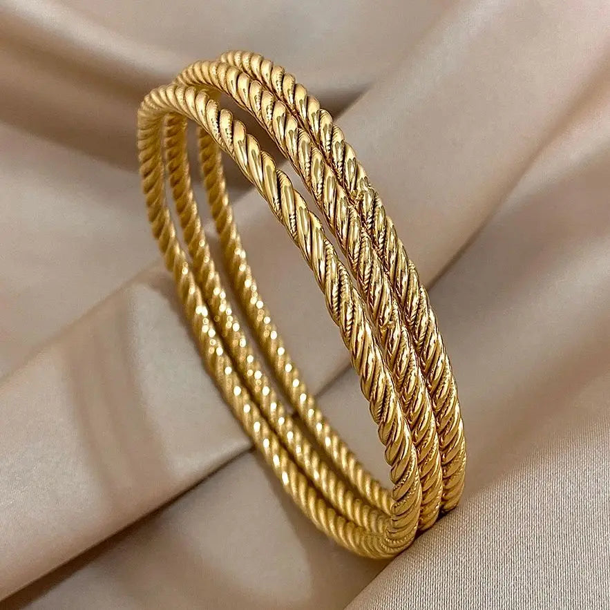 Three-Piece Rope-Textured Stainless Steel Bangle Set in Gold-Tone or Silver-Tone - Image 1