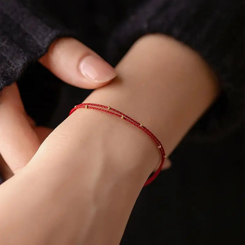 Red or Black Cord Bracelet with Bead Detail and Adjustable Fit - Image 1