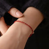 Red or Black Cord Bracelet with Bead Detail and Adjustable Fit - Image 1
