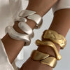 Wide Wave Cuff Bangle in Matte Gold-Tone and Silver-Tone Alloy - Image 11