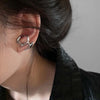 Irregular Twisted Hoop Earrings with Sculptural Metal Profile - Image 9