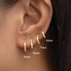 Crystal Huggie Hoop Earrings in Gold-Tone or Silver-Tone - Image 1