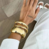 Wide Metal Spring Cuff Bangle with Geometric Coil Design - Image 2