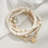 Five-Piece Resin Bead Bracelet Set with Round Charms and Elastic Bands - Image 4