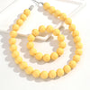 Two-Piece Acrylic Bead Necklace and Bracelet Set with Geometric Shapes - Image 24