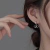 Silver Needle Hollow Bowknot Pendant Hoop Earrings For Women Classic Jewelry Minimalist Accessories - Image 4