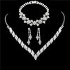 Rhinestone V Necklace and Drop Earrings Bridal Jewelry Set with Optional Bracelet - Image 1