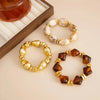 Three Piece Acrylic Bead Bracelet Set with Baroque Style Accents - Image 4