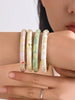 Three-Piece Enamel Flower Bracelet Set in Gold-Tone - Image 9