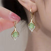 Korean Angel Eye Earrings Gold Color Plated Rhinestones Inlay Tulip Petal Hoop Earring Women's Party Jewelry - Image 1