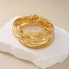 Multilayer Open Bangle Set 12 Pieces in Gold-Tone - Image 2