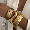 Wide Wave Cuff Bangle in Matte Gold-Tone and Silver-Tone Alloy - Image 3