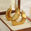 U-Shaped Chunky Hoop Earrings with Geometric Profile - Image 16