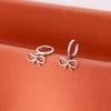 Silver Needle Hollow Bowknot Pendant Hoop Earrings For Women Classic Jewelry Minimalist Accessories - Image 2