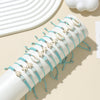 12-Piece Braided Bracelet Set with Shell Starfish and Turtle Charms - Image 8