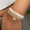 Five-Piece Resin Bead Bracelet Set with Round Charms and Elastic Bands - Image 6