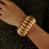 Elegant Chunky Matte Gold Ribbed Bracelet Sculptural Statement Accessory For Womens Everyday And Evening Styling - Image 4
