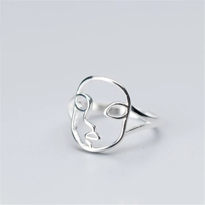 Creative Hollow Face Shaped Jewelry Silver Personality Delicate Asymmetric Opening Rings - Image 1