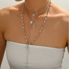 Layered Rosary Cross Necklace with Mary Pendant and Beaded Y Chain - Image 3