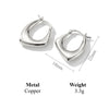 Geometric Twisted Hoop Earrings in Gold-Tone or Silver-Tone - Image 7