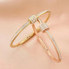 Stainless Steel Bangle Bracelet with Cubic Zirconia Details in Gold-Tone or Silver-Tone - Image 17