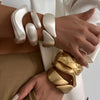 Wide Wave Cuff Bangle in Matte Gold-Tone and Silver-Tone Alloy - Image 2