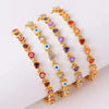 Gold-Tone Eye Motif Bracelet with Colorful Stone Accents - Image 4