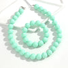 Two-Piece Acrylic Bead Necklace and Bracelet Set with Geometric Shapes - Image 9