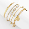 Five-Piece Resin Bead Bracelet Set with Round Charms and Elastic Bands - Image 11