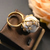 vintage brass ring set with a Baroque pearl flower bud stud - Image 2