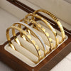 316L Stainless Steel Bangle Bracelet with Cubic Zirconia Details in Gold-Tone - Image 39