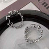 Irregular Twisted Hoop Earrings with Sculptural Metal Profile - Image 5
