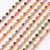Gold-Tone Eye Motif Bracelet with Colorful Stone Accents - Image 1