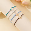 4-Piece Braided Bracelet Set, Adjustable Multicolor Bands with Mountain-Inspired Designs - Four-piece set