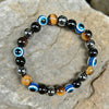 Evil Eye Beaded Bracelet, Handmade Brown and Black Stone-Style Beads with Magnetic Detail - Product view 1