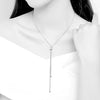 Silver-tone lariat necklace shown on a model
