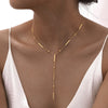 Y-Shaped Tassel Necklace for Women, Gold-Tone Titanium Steel Long Chain with Round Bead and Bar Details - Product view 1