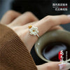 Lotus Flower Open Ring for Women, Silver-Tone Band with Gold-Tone Seated Figure Accent