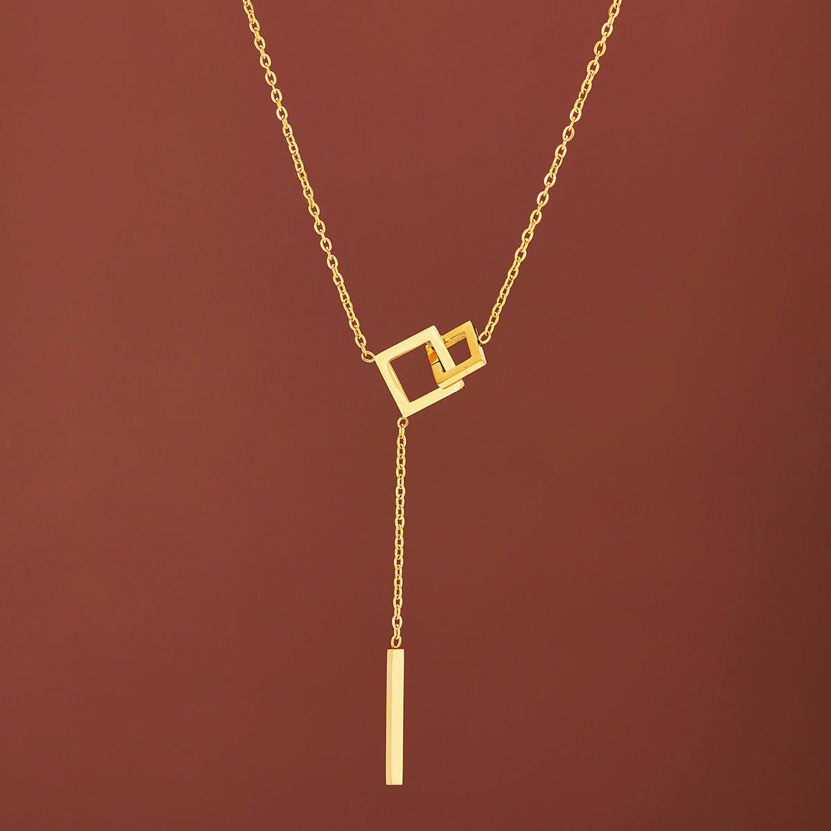 Interlocking Square Pendant Necklace for Women, Titanium Steel Chain with Tassel Detail - Product view 1