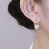 Rotating Hoop Earrings for Women, Gold-Tone Copper Design with Sparkling Zircon Accents - Product view 3