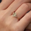 Oval Accent Ring for Women, Pale Green Center with Clear Halo and Gold-Tone Band