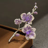 Orchid Brooch Pin for Women, Silver-Tone Zinc Alloy Floral Design with Purple Sparkling Accents - Product view 1