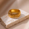 Stainless Steel Ribbed Band Ring with Pointed Stripe Texture in Gold Tone or Silver Tone in Sizes 6 to 8 - Image 1