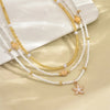 Layered Beaded Choker Necklace for Women with a Starfish Pendant and Gold-Tone Chains - Image 3