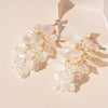 White Flower Petal Tassel Drop Earrings for Women with Layered Floral Details for Weddings and Parties - Image 1