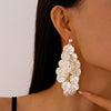White Flower Petal Tassel Drop Earrings for Women with Layered Floral Details for Weddings and Parties - Image 4