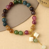 Colorful Beaded Bracelet with a Lily of the Valley Charm
